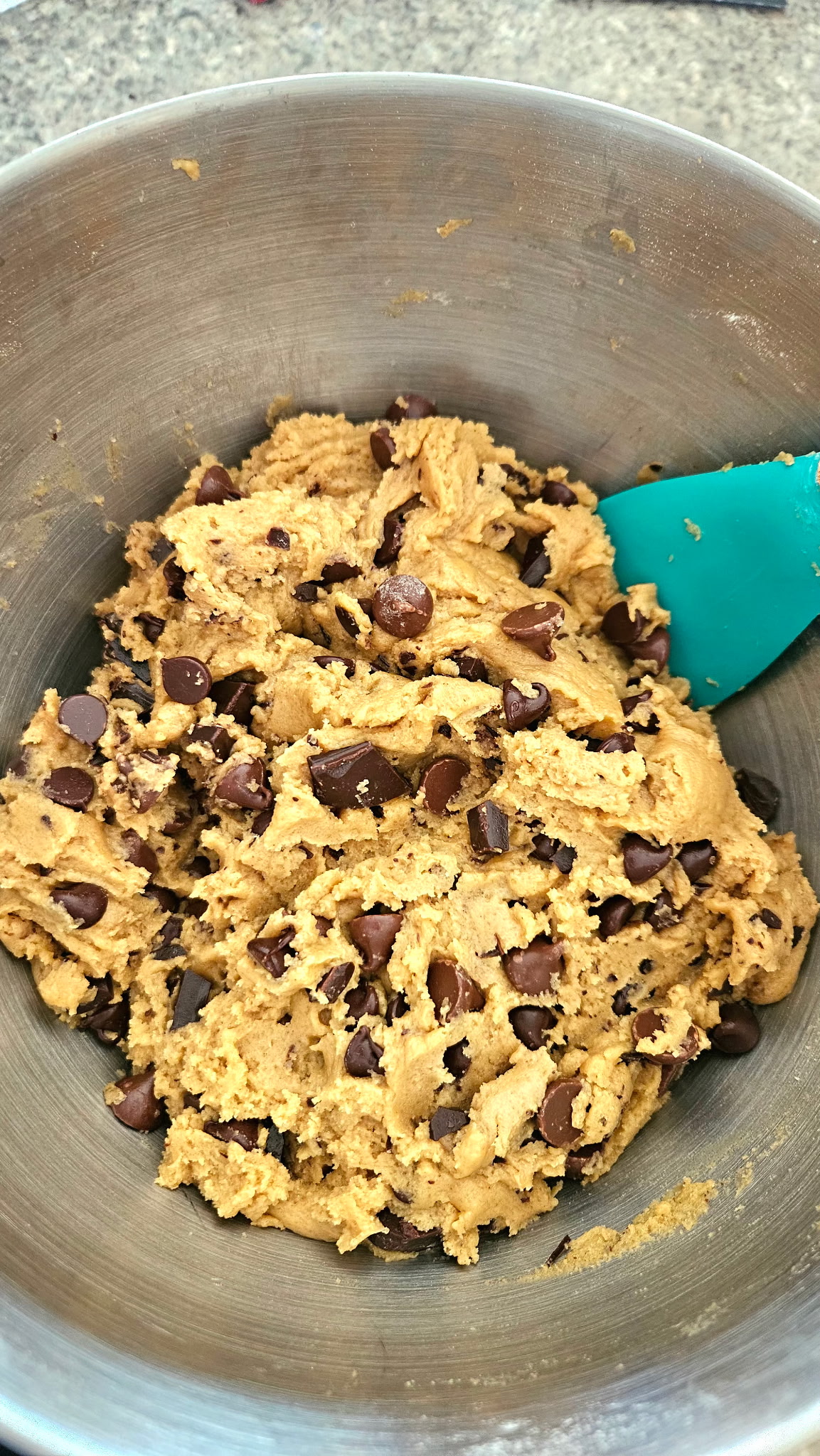 Cookie dough being mixed in a bowl